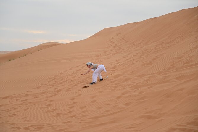 4 Hour Morning Desert Safari with Camel Ride & Sand Boarding - Dune bashing brings the main rush