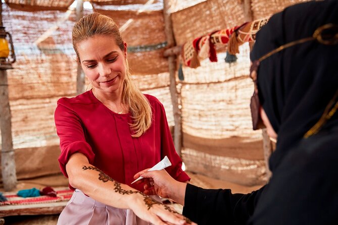 4x4 Desert Safari Abu Dhabi with BBQ Dinner - The camel farm stop and short ride