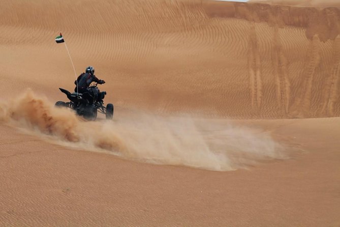 4x4 Self-Drive Quad Bike Safari with Camel Riding - Photo stops, water and a short rest