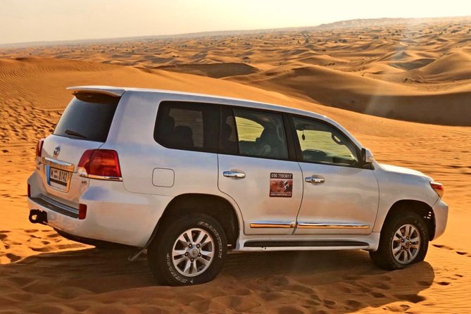 6 Hour Private Evening Desert Safari With BBQ Dinner - Red dunes, sunset, and a private four-wheel-drive ride