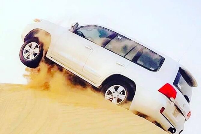 Abu Dhabi: 7-Hours Desert Safari with BBQ, Camel Ride & Sandboarding - Entering the Bedouin-style camp