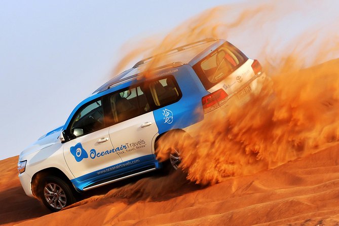 Abu Dhabi: Desert Safari with BBQ, Camel Ride & Sandboarding - A camel farm before the big ride