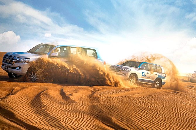 Abu Dhabi: Desert Safari with BBQ, Camel Ride & Sandboarding - Tanoura, belly dancing, and the evening program