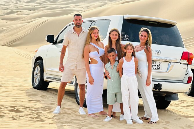 Abu Dhabi Desert Safari With Live Shows And BBQ Buffet Dinner - Camel riding and sand boarding