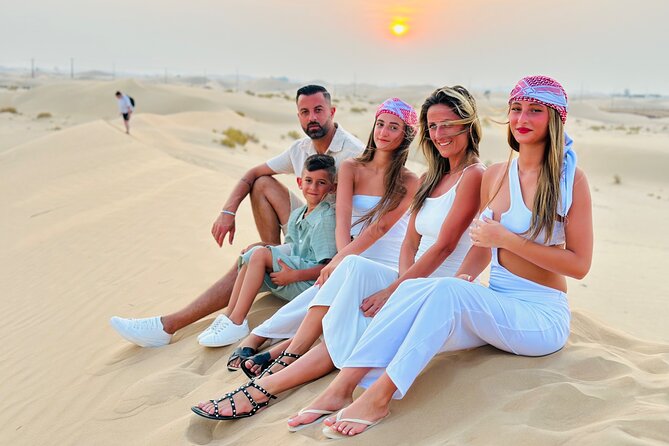 Abu Dhabi Desert Safari With Live Shows And BBQ Buffet Dinner - Sunset photos, henna, and a slower hour