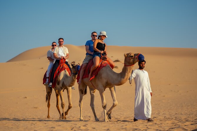 Abu Dhabi Evening Desert Safari - Private car Dune bashing & BBQ - Leaving Abu Dhabi for the open desert