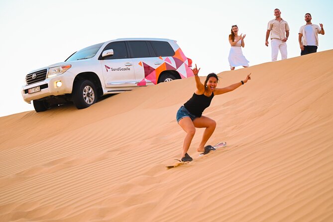 Abu Dhabi Evening Desert Safari - Private car Dune bashing & BBQ - From stage lights to desert stars