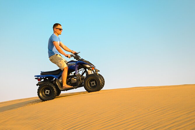 Abu Dhabi Evening Desert Safari - Private car Dune bashing & BBQ - Dune bashing and sand boarding in the soft sand