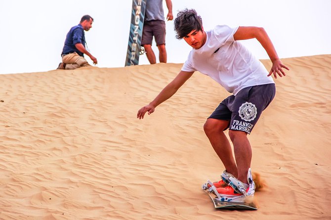 Abu Dhabi Evening Desert Safari with BBQ Dinner and all Camp Activities - Henna, Arabic coffee, and camp activities