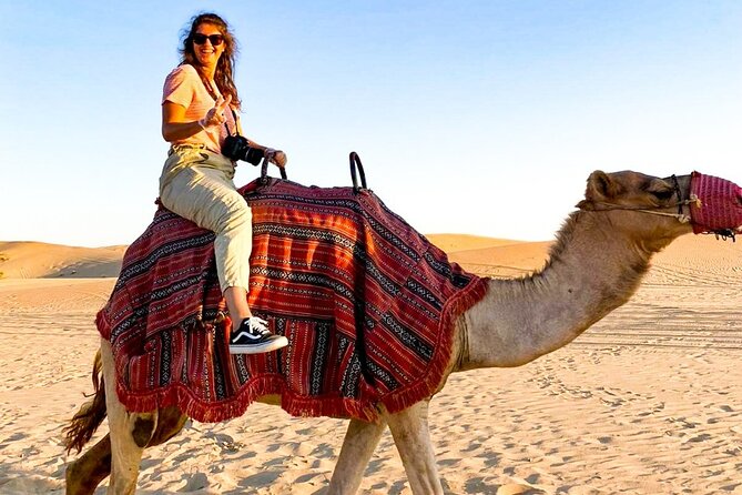 Abu Dhabi: Evening Desert Safari with Camel Ride, BBQ & Live Show - BBQ dinner, tea, dates, and the evening shows