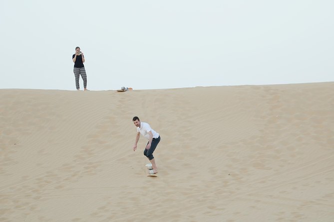 Abu Dhabi Morning Desert Safari - Sandboarding on Abu Dhabi’s dunes