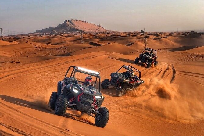 Adventurous Red Dune Desert Safari Deal with Quad Bike,Shows &BBQ - Red Dunes, Shared Rides, and a Busy Evening
