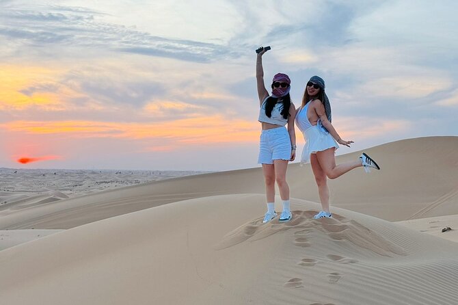 Arabian Desert Safari Abu Dhabi: 6Hour Tour with BBQ & Live Shows - The Land Cruiser ride and high dune photo stop