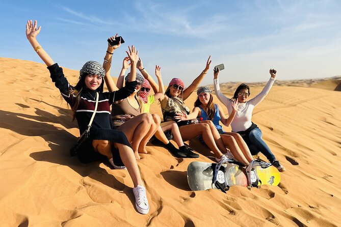 Best Dubai Desert Safari with Buffet Dinner,Sand Boarding & Shows - The Bedouin-style camp and its short camel ride
