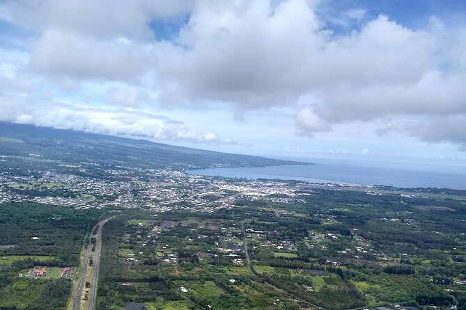 Big Island, Hawaii: Volcanoes National Park Safari - Flying from Hilo into volcanic country