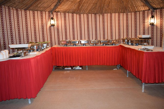 Classic Dubai Desert Safari with BBQ Dinner and Camp activities - Sunset at the desert camp