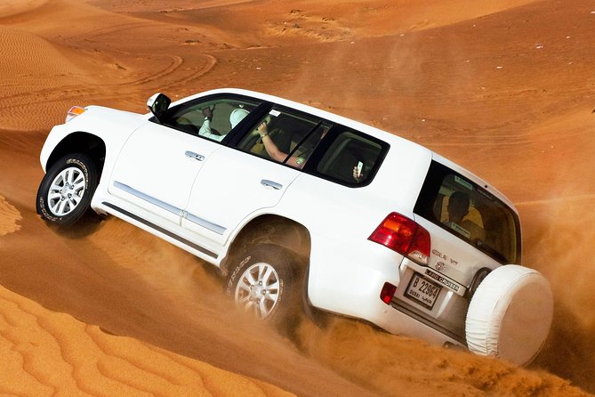 Combo Dubai City Tour and 4X4 Desert Safari with Dinner - BBQ buffet, unlimited soft drinks, and evening shows