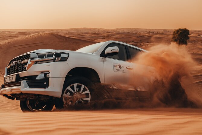 Deluxe Sunset Desert Safari: SandSurfing, Camel Ride & BBQ dinner - From Dubai streets to the Red Dunes