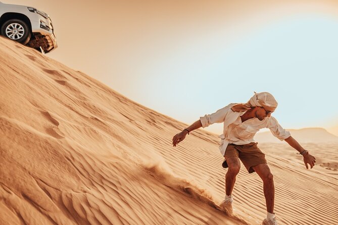 Deluxe Sunset Desert Safari: SandSurfing, Camel Ride & BBQ dinner - Thirty minutes of dune bashing in the Red Dunes