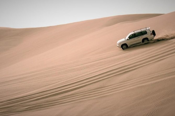 Desert Combo safari, Camel ride, Quad Bike and Dune Bashing(ALL INCLUSIVE) - Dune bashing with the 4x4 driver