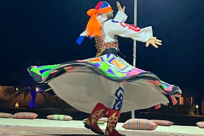 Desert Safari Abu Dhabi w/ Sand Boarding, Camel Ride & BBQ Dinner - Belly dancing, tanoura, and a lively finish