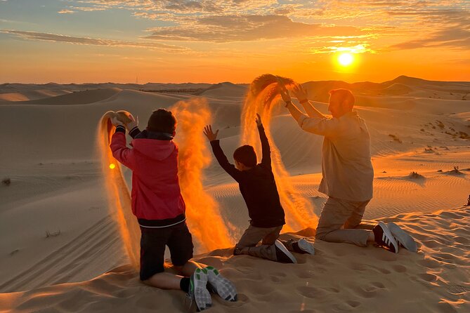 Desert Safari Abu Dhabi w/ Sand Boarding, Camel Ride & BBQ Dinner - A camel farm before the main ride