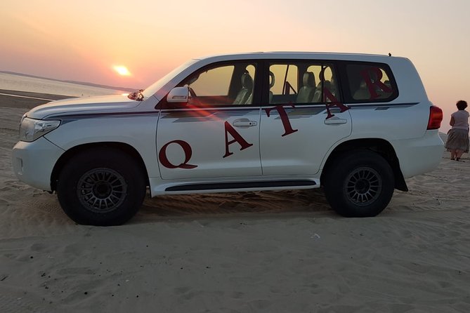 Desert Safari Adventure 4 hours from Doha with Pickup - Sunset beside the Inland Sea