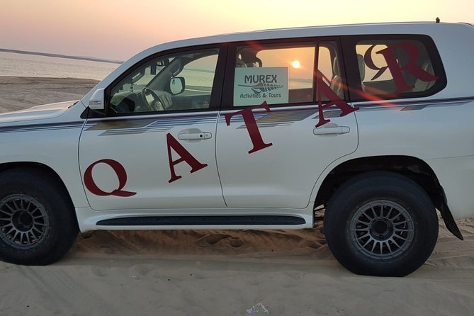 Desert Safari Adventure 4 hours from Doha with Pickup - Sandboarding and desert photographs