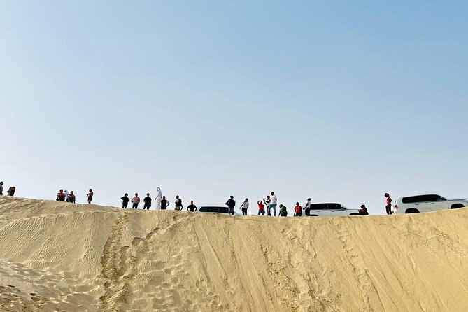 Desert Safari Combo: Camel Ride, Sandboarding & Inland Sea Visit - Dune bashing across the Mesaieed Desert