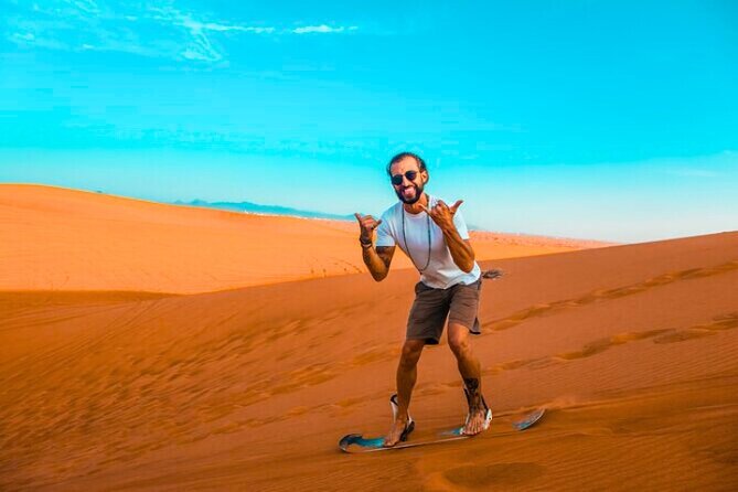 Desert Safari Dubai 30 Mins Quad Bike, Sand Board, Camel Ride BBQ - Camel riding and sandboarding at camp