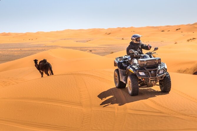 Desert Safari Dubai - Arabic clothing, henna, and the camel stop