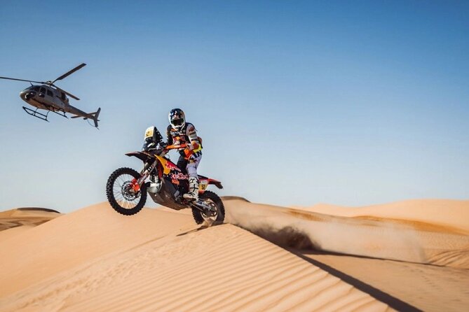 Desert Safari Dubai Sand Bashing, Camel Ride, Shows, Live BBQ - Camel riding and sandboarding at the camp