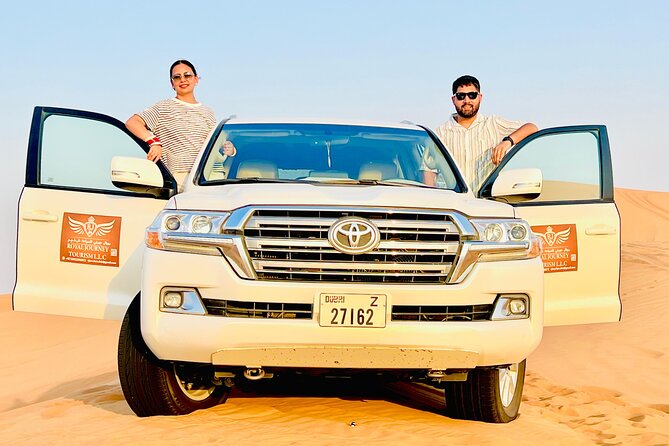 Desert Safari Dubai with BBQ Dinner & Camel Ride - Sandboarding gives the dunes a second kind of thrill