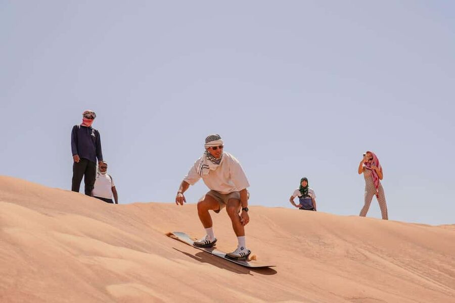 Desert Safari Dubai with Camel Ride, Sandboarding & Dinner - Door-to-door pickup from three emirates