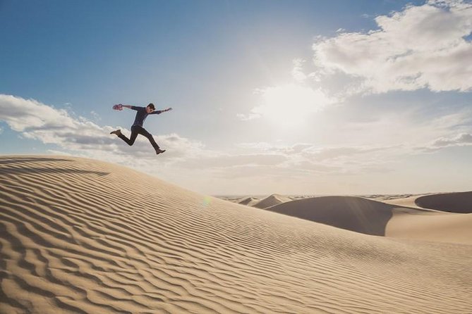Desert safari, Dune bashing, sandboarding, camel, ATV Option - Pickup and the ride into the sand