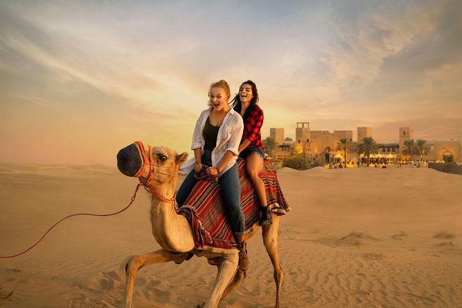 Desert Safari: Luxury Fortress Dinner, Camel Ride & Dune Bashing - Camel and horse rides, henna, and the falcon display
