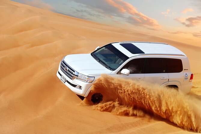 Desert Safari: Luxury Fortress Dinner, Camel Ride & Dune Bashing - An evening of belly dancing, Tanoura, and fire