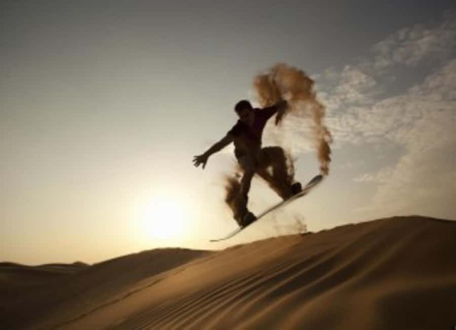 Desert Safari, Quad Bike, Camel Ride, Falcon & Sandboarding - Deflating the tires before the real drive begins