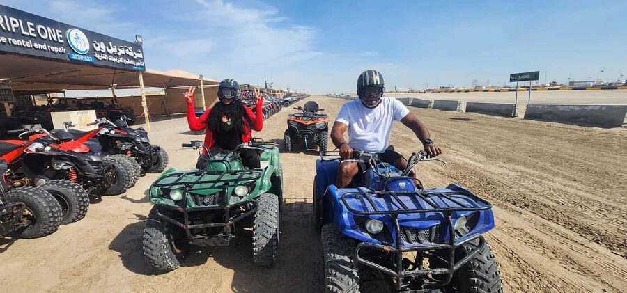 Desert Safari, QuadBike,Dune buggy, Sandboarding & CamelRide - Sandboarding on the golden slopes