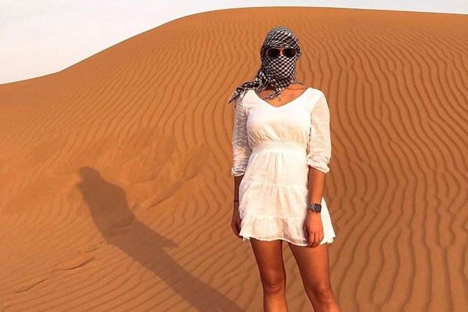 Desert Safari Red Dunes with Camel Ride, Sandboard, BBQ and Shows - Three shows after dark