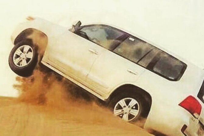 Desert Safari With BBQ Dinner, Quad Bike & Camel Ride from Dubai - Quad biking for 25 minutes