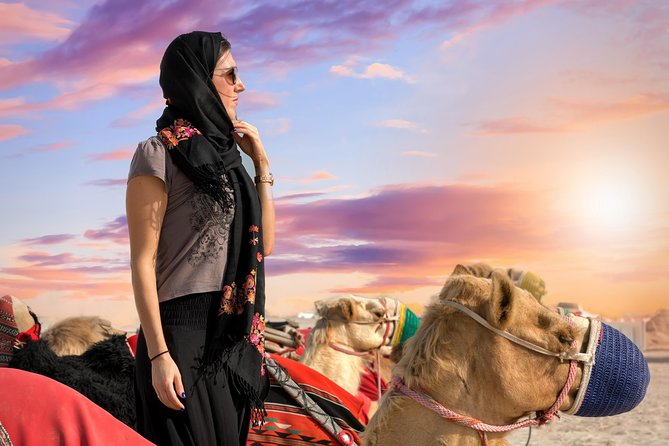 Desert Safari with Camel Ride, Sand Boarding & Inland Sea Tour in Doha - Dune bashing in a Land Cruiser