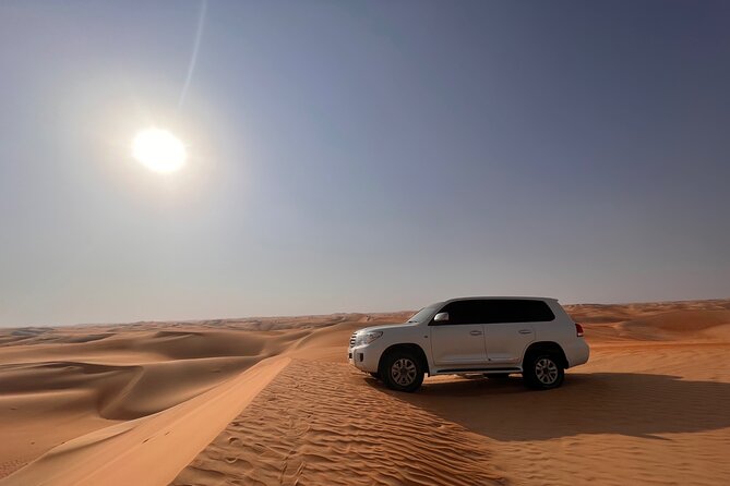 Desert Safari with Dune Bashing and Camel Ride plus Sand Boarding - Dune bashing across Al Khatim