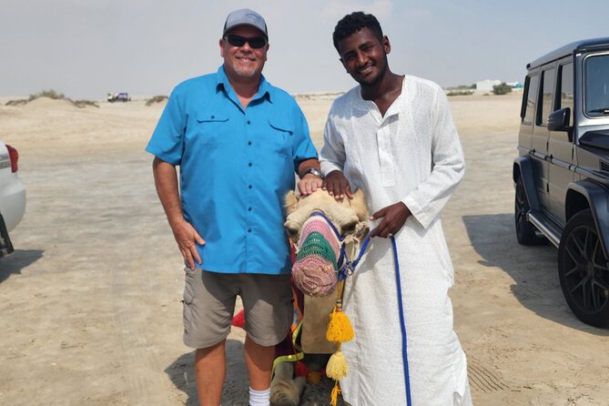 Desert Safari with Sandboarding and Inland Sea Private Tour - What the $75 price includes