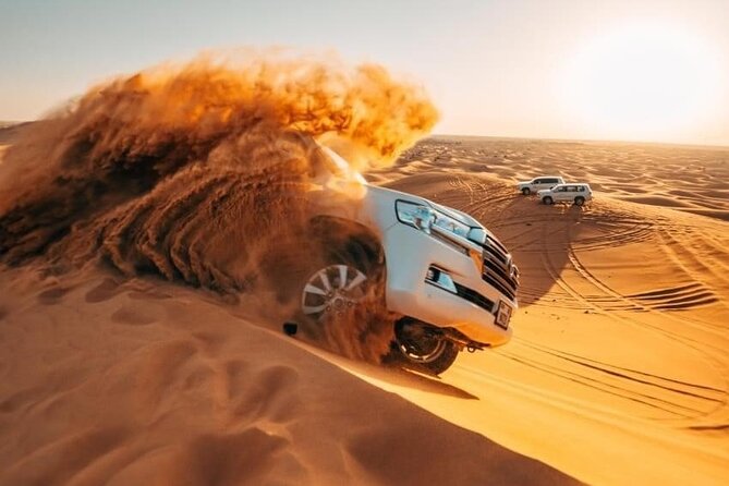 Desert Thrills: Evening Safari with Quad Bike & Camp Activities - Lahbab’s red dunes: quad biking, sandboarding, and dune bashing