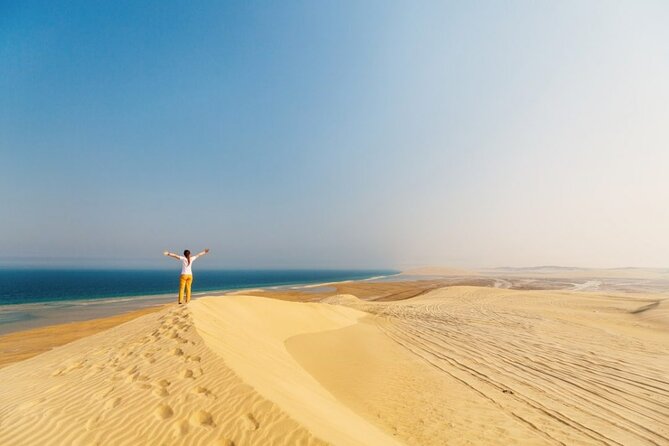 Doha Desert Safari Camel Ride, Sandboarding and Inland Sea - 4x4 dune bashing with a careful driver