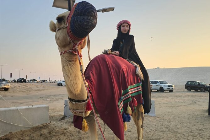 Doha Desert Safari Dune Bashing Camel Ride - Falcon photos, camp atmosphere, and local stories