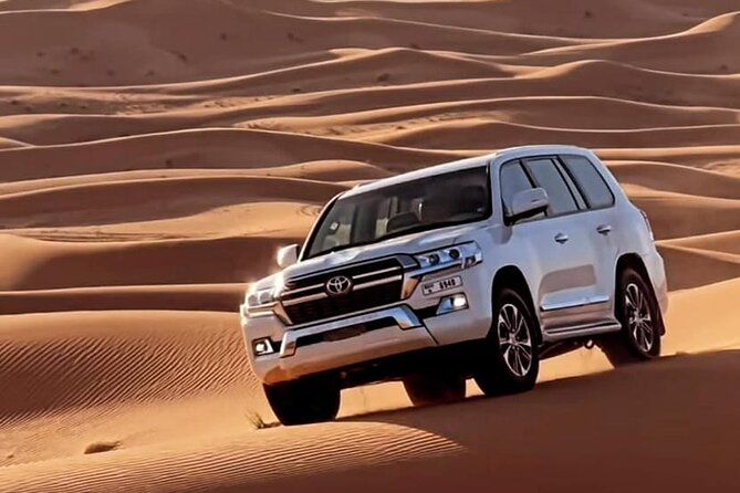 Doha: Desert Safari: Dune Bashing, Quad Bikes & Camel Rides - Sandboarding at the tourist point