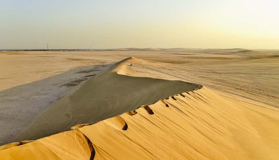 Doha: Desert Safari, Dune Bashing, Sandboarding, Camel Ride - Leaving Doha in a cool 4WD