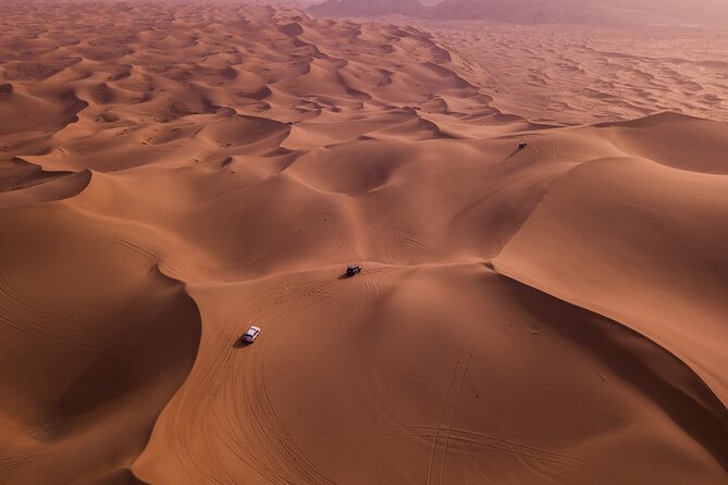 Doha Desert Safari Dune bashing,Sandboarding,CamelRide,Inland Sea - Dune bashing is the main burst of adrenaline